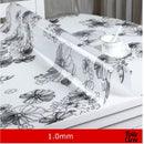 Nappe transparente fleurie noire