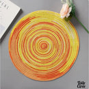 Set de table rond tresse en PVC multicolore