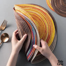 Set de table rond tresse en PVC multicolore