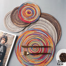 Set de table rond tresse en PVC multicolore