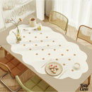 Toile cirée beige à pois blancs