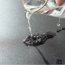 Toile cirée noire unie